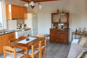 Кухня или мини-кухня в La Casa di Odyssey

