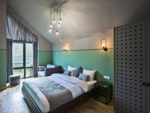 Postel nebo postele na pokoji v ubytování Hover Boutique Hotel + 37 fotografií