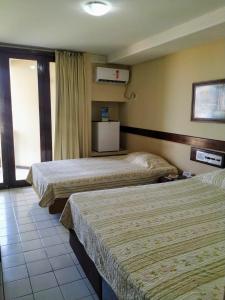 Cama o camas de una habitación en Sol Praia Marina Hotel