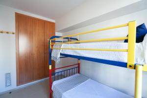 Postel nebo postele na pokoji v ubytování UHC Casa Daurada