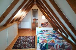 Postel nebo postele na pokoji v ubytování Atelierhaus Beckmann