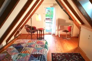 Postel nebo postele na pokoji v ubytování Atelierhaus Beckmann