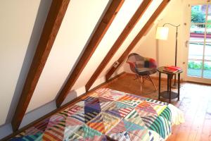 Postel nebo postele na pokoji v ubytování Atelierhaus Beckmann
