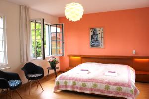 Postel nebo postele na pokoji v ubytování Atelierhaus Beckmann