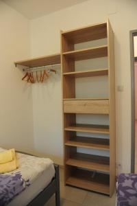 Postel nebo postele na pokoji v ubytování Apartmani Ivišić