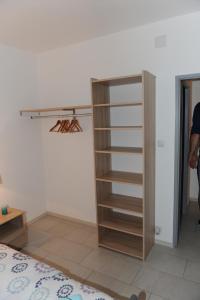 Postel nebo postele na pokoji v ubytování Apartmani Ivišić