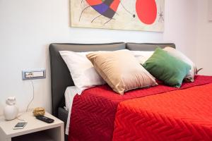 A bed or beds in a room at Cilento Suite - Vinarte B&B