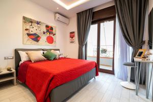 A bed or beds in a room at Cilento Suite - Vinarte B&B