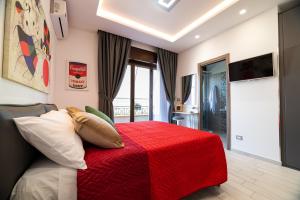 A television and/or entertainment centre at Cilento Suite - Vinarte B&B