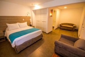 Voodi või voodid majutusasutuse Hotel Mae toas