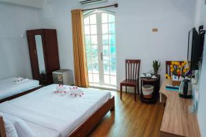 Postel nebo postele na pokoji v ubytování H79 HOTEL
