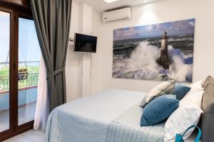 A bed or beds in a room at Cilento Suite - Vinarte B&B