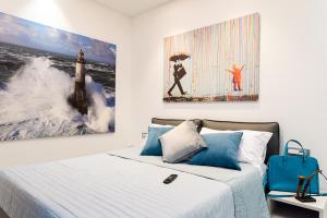 A bed or beds in a room at Cilento Suite - Vinarte B&B