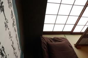 Postel nebo postele na pokoji v ubytování Hostel Tomal