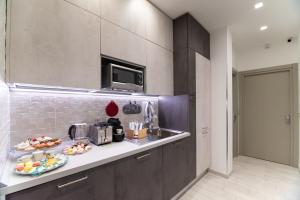 A kitchen or kitchenette at Cilento Suite - Vinarte B&B