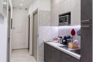 A kitchen or kitchenette at Cilento Suite - Vinarte B&B