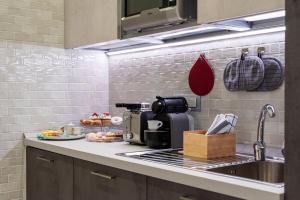 A kitchen or kitchenette at Cilento Suite - Vinarte B&B