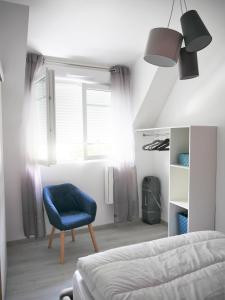 En eller flere senge i et værelse på Casa Maya