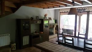 Kuchyň nebo kuchyňský kout v ubytování LAS VILLAS DEL PONTON