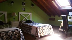 Postel nebo postele na pokoji v ubytování LAS VILLAS DEL PONTON