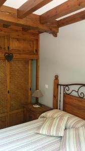 Postel nebo postele na pokoji v ubytování LAS VILLAS DEL PONTON