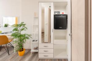 TV a/nebo společenská místnost v ubytování Rooms L17
