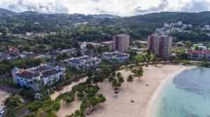 an aerial view of a resort on a beach at Coconut Shell At Turtle Towers in Ocho Rios