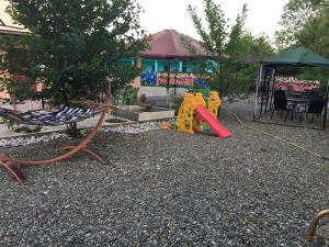 Zona de juegos infantil en Guest House Flamenco