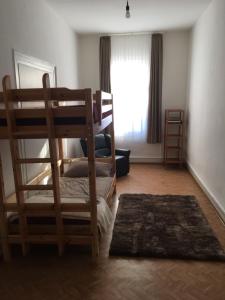 Postel nebo postele na pokoji v ubytování Das Loreley Weinstuebchen