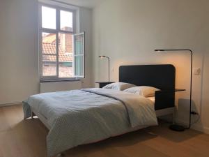 Ένα ή περισσότερα κρεβάτια σε δωμάτιο στο Bed & Boon