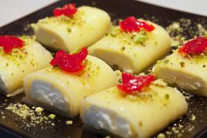 a bunch of marshmallows sitting on a plate at Holiday House maisonette in Limassol