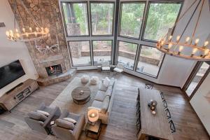 an overhead view of a living room with a fireplace at The Cabin Home in Show Low