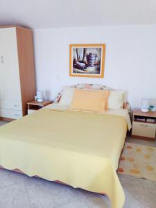 Postel nebo postele na pokoji v ubytování apartmani Mandic