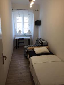 Posteľ alebo postele v izbe v ubytovaní Apartman Licia