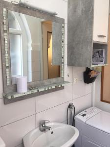 Kúpeľňa v ubytovaní Apartman Licia