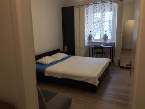 Posteľ alebo postele v izbe v ubytovaní Apartman Licia