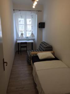Posteľ alebo postele v izbe v ubytovaní Apartman Licia