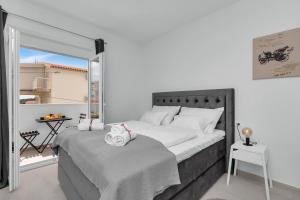 Postel nebo postele na pokoji v ubytování Apartments Morpheus