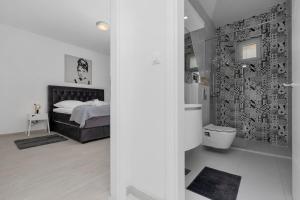 Koupelna v ubytování Apartments Morpheus + 17 fotografií