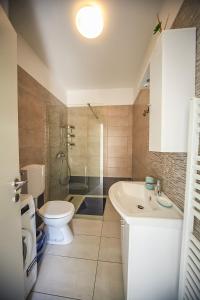Koupelna v ubytování Apartman Carmen Volosko + 12 fotografií