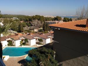 an aerial view of a house with a swimming pool at Luxury CAP SALOU with POOL & BARBECUE & WIFI in Salou