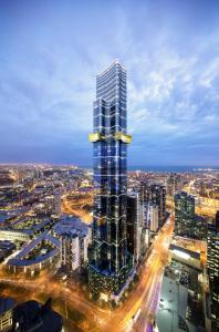 a city with tall buildings and a sky background at Australia 108 in Melbourne