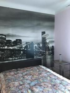 Кровать или кровати в номере Imanta Apartment