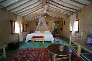 Voodi või voodid majutusasutuse Lodge Hara Oasis toas