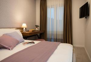 TV a/nebo společenská místnost v ubytování Luxury Apartment Mr. Perfect