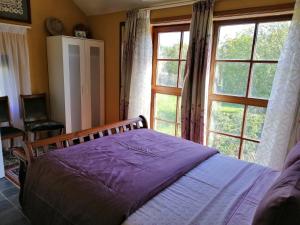Een bed of bedden in een kamer bij Johan's Lodge