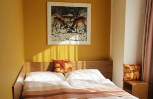 Posteľ alebo postele v izbe v ubytovaní Afrika Hotel Frýdek-Místek