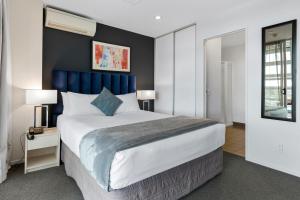 Ein Bett oder Betten in einem Zimmer der Unterkunft Proximity Apartments Manukau / Auckland Airport
