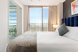 Ein Bett oder Betten in einem Zimmer der Unterkunft Proximity Apartments Manukau / Auckland Airport