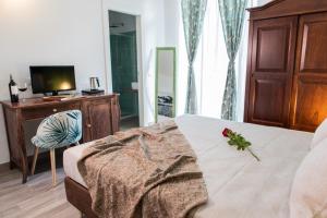 Postel nebo postele na pokoji v ubytování Demithos Rooms